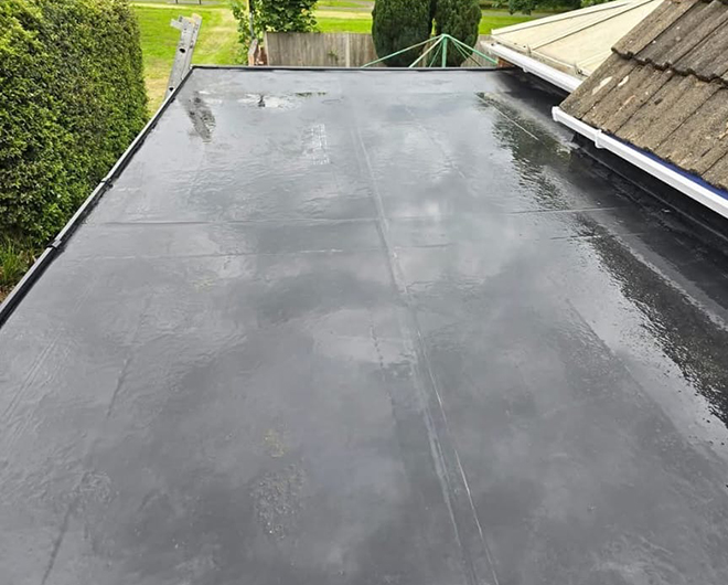 0d2f15c4-8907-4178-a031-5efcf2cacd6d-660x530 flat roof with water